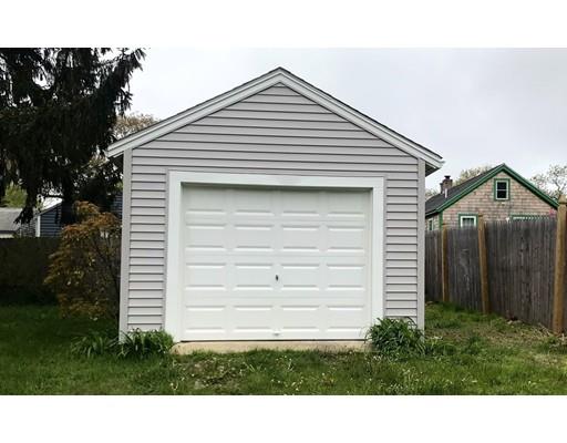 68 Leland Road Marshfield, MA 02050 - Photo 23 of 28 a front view of a house with a yard