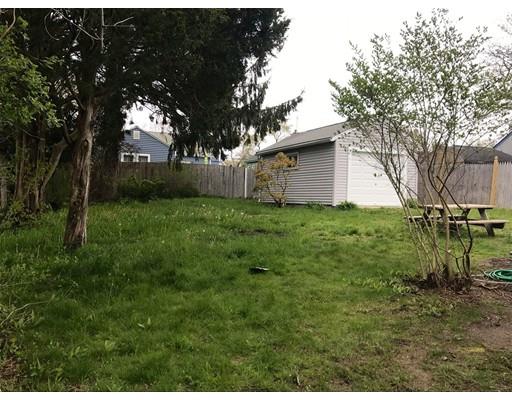 68 Leland Road Marshfield, MA 02050 - Photo 25 of 28 a backyard of a house with lots of green space