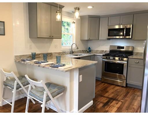 68 Leland Road Marshfield, MA 02050 - Photo 3 of 28 a kitchen with a sink stove top oven and microwave