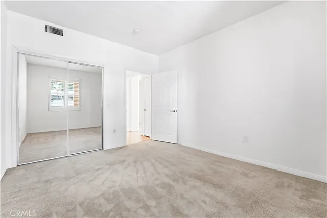 a kitchen with stainless steel appliances granite countertop a sink stove and microwave