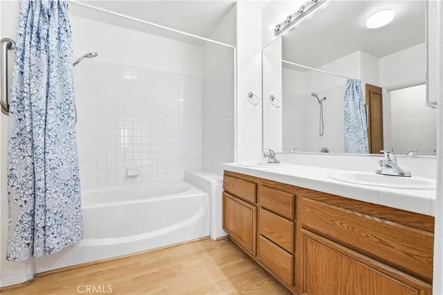 a kitchen with granite countertop stainless steel appliances a stove sink and microwave