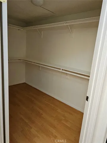 a view of a balcony with wooden floor