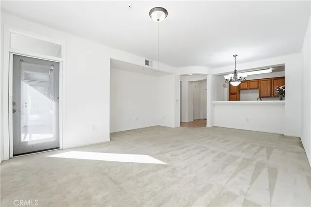 a view of parking garage with cars