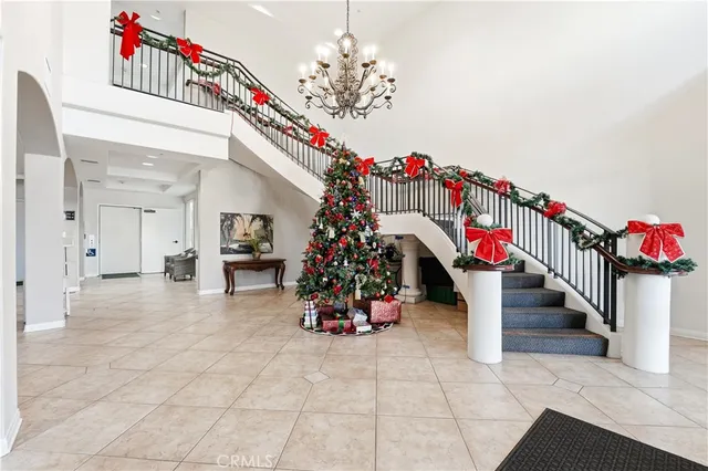 a view of a swimming pool with outdoor seating