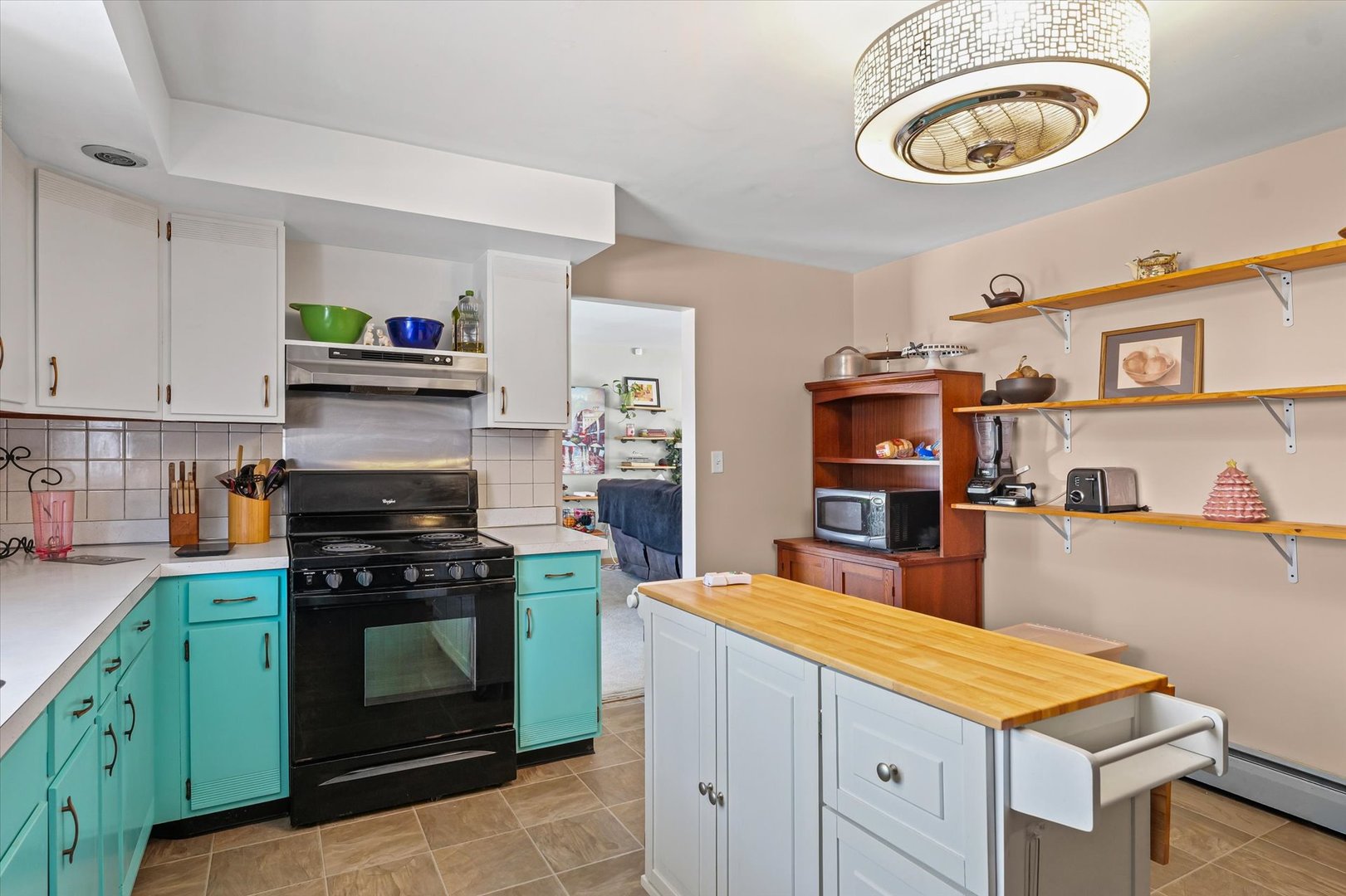 2018 South Cottage Grove Avenue Urbana, IL 61801 - Photo 11 of 31 a kitchen with stainless steel appliances granite countertop a stove and cabinets