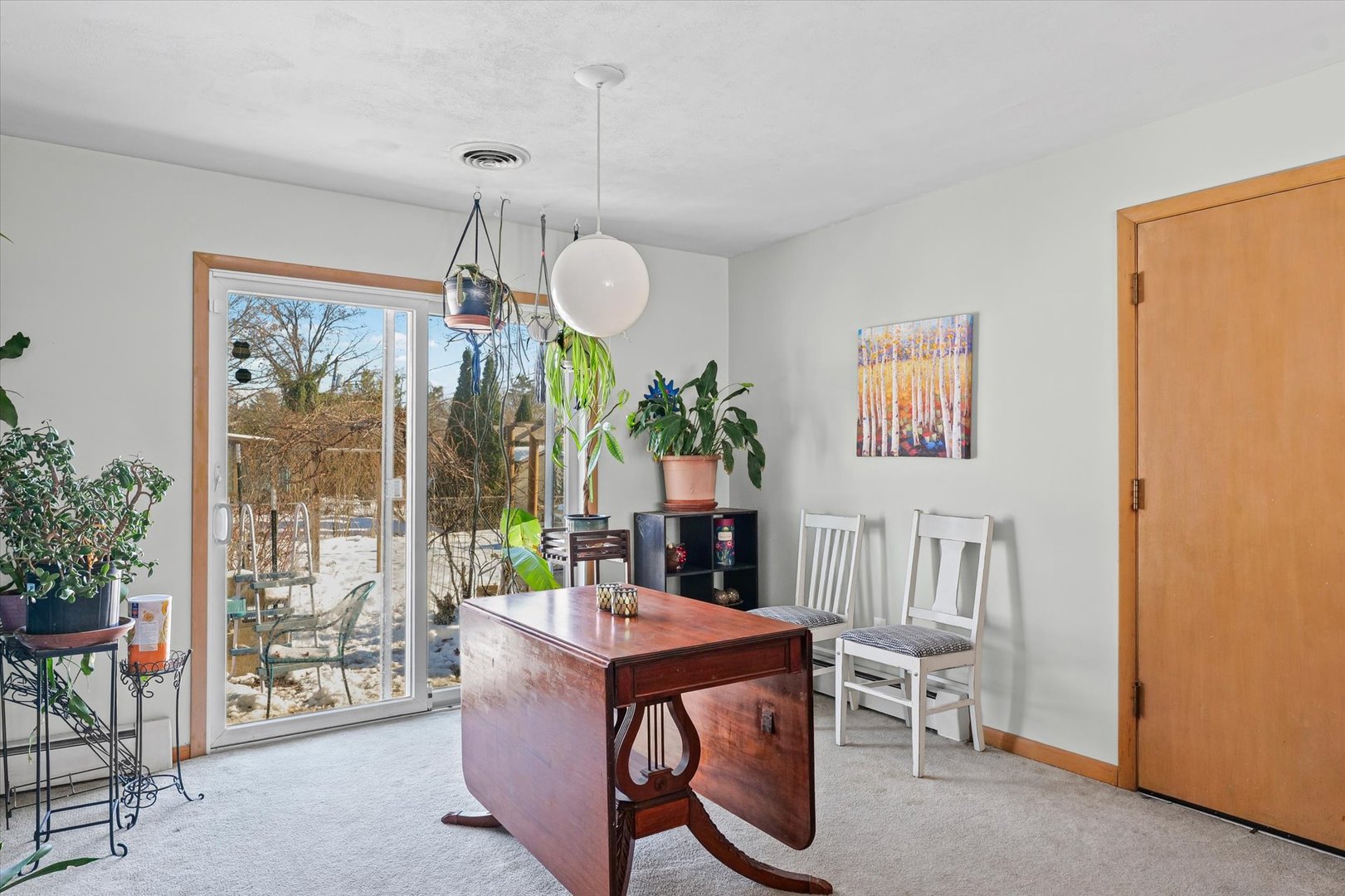 2018 South Cottage Grove Avenue Urbana, IL 61801 - Photo 13 of 31 a living room with furniture a lamp and a window