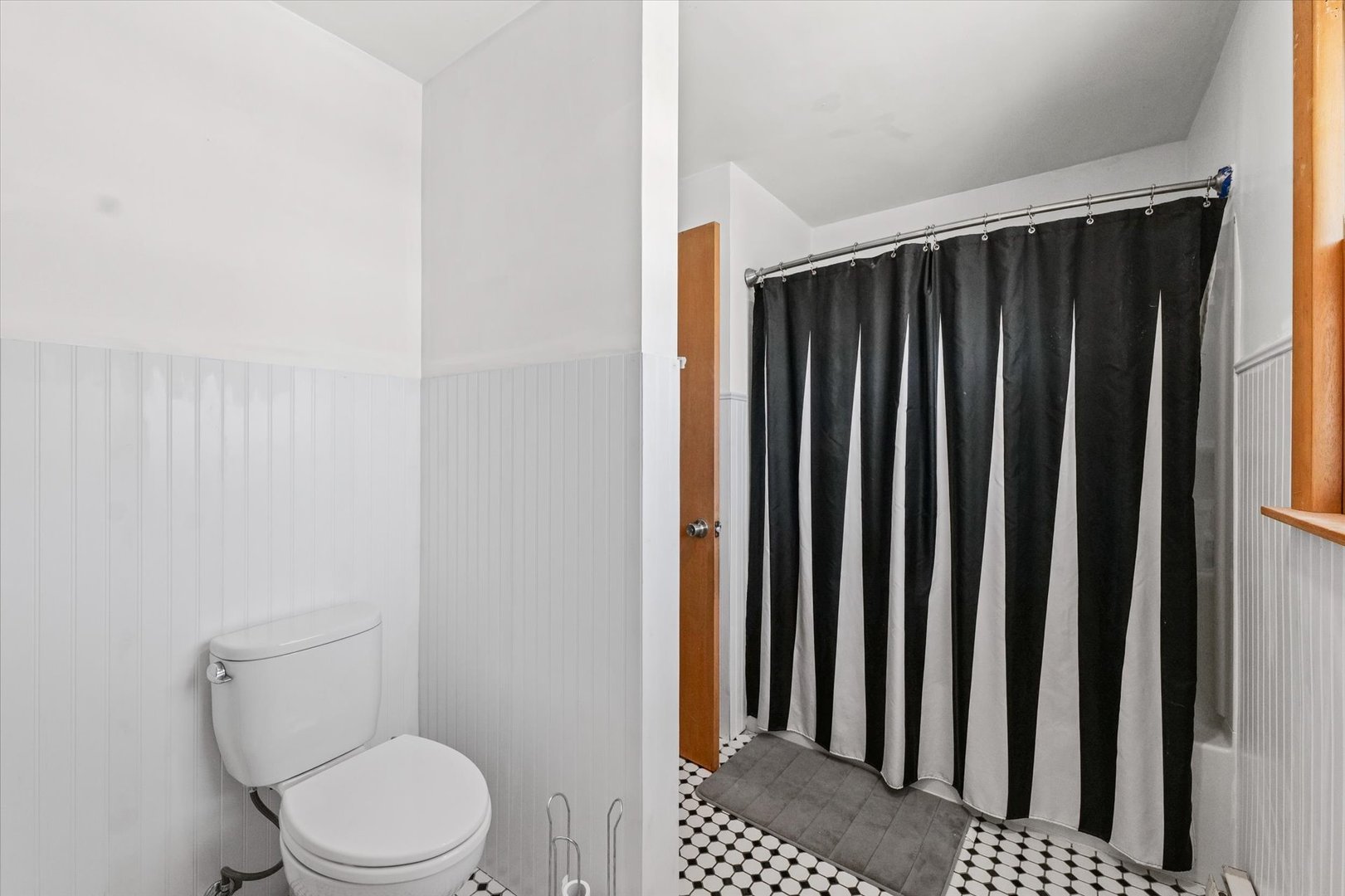 2018 South Cottage Grove Avenue Urbana, IL 61801 - Photo 15 of 31 a bathroom with a toilet and a shower