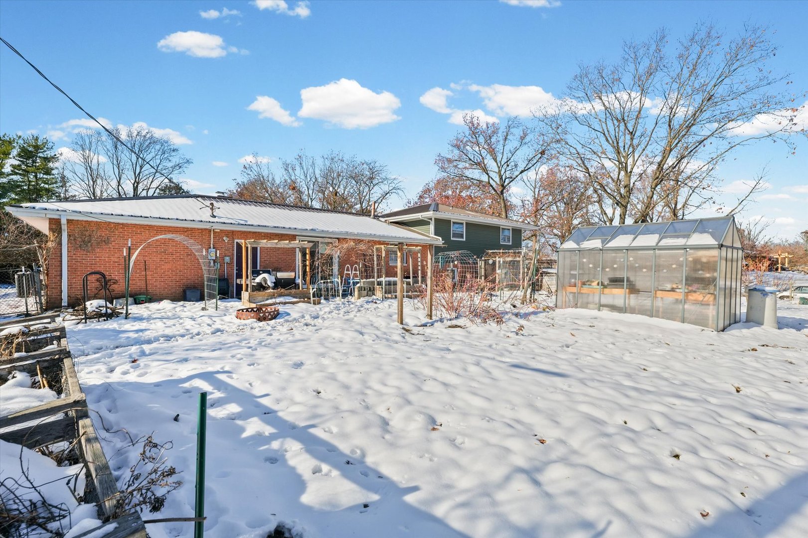 2018 South Cottage Grove Avenue Urbana, IL 61801 - Photo 29 of 31 a view of a house with snow on the road