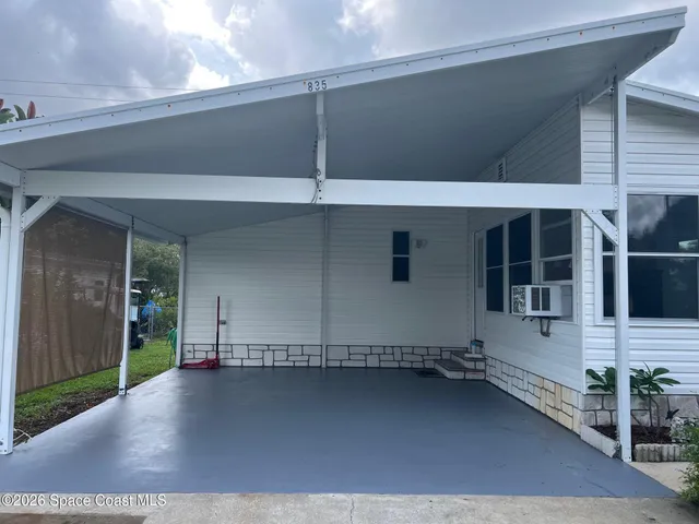 $215,000 | 835 Vireo Drive, Barefoot Bay, FL 32976