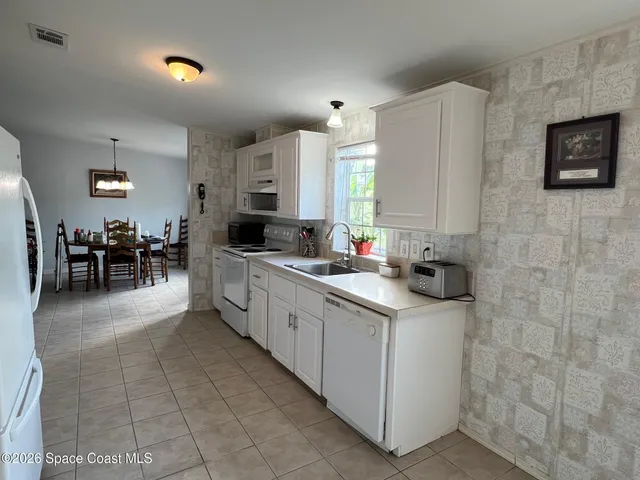 $215,000 | 835 Vireo Drive, Barefoot Bay, FL 32976