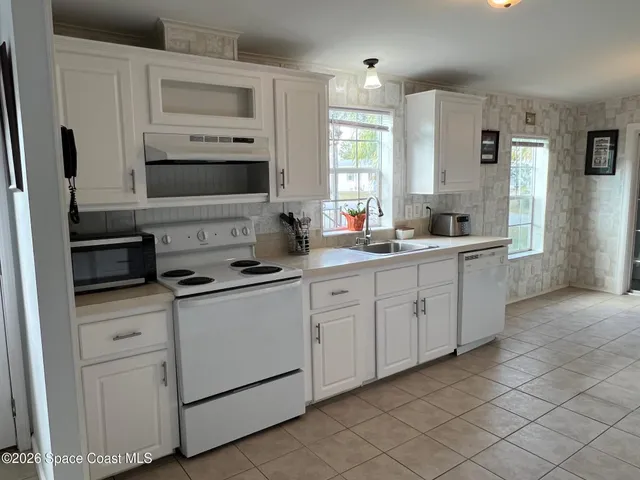 $215,000 | 835 Vireo Drive, Barefoot Bay, FL 32976