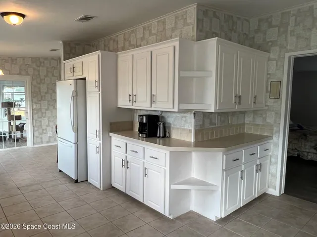 $215,000 | 835 Vireo Drive, Barefoot Bay, FL 32976