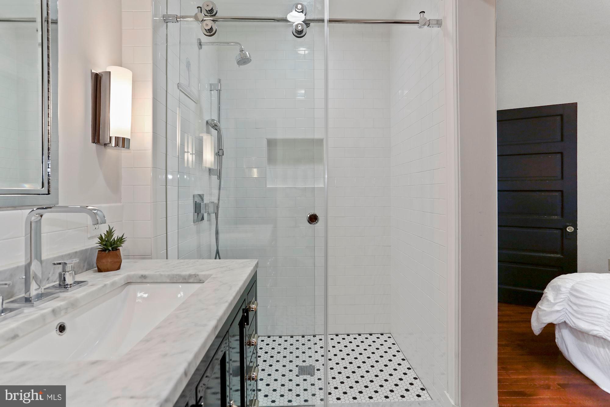 1419 R Street Northwest, Unit 10 Washington, DC 20009 - Photo 17 of 22 Glass frameless waterfall shower