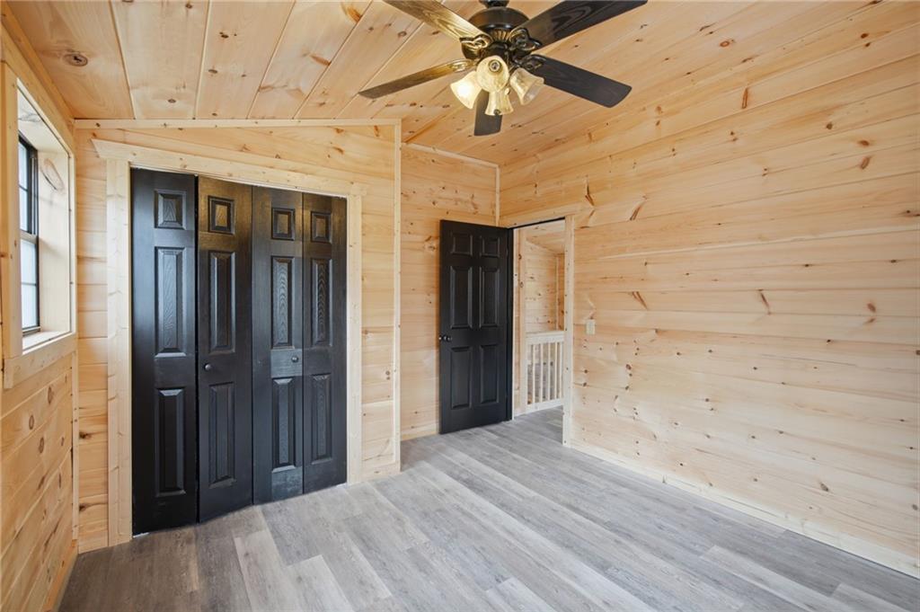 1780 Conasauga Road Ellijay, GA 30540 - Photo 27 of 43 a view of a hallway with wooden floor