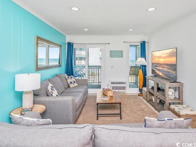 9530 Shore Drive, Unit 2D Myrtle Beach, SC 29572 - Photo 7 of 25 Living room with crown molding and recessed lighting