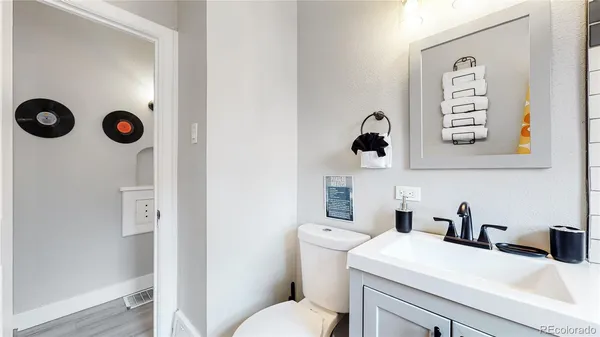 a bathroom with a sink and a toilet