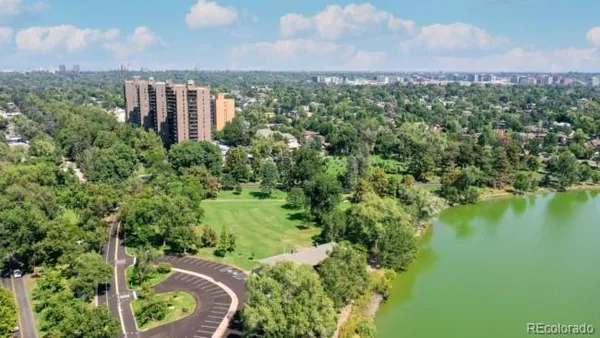 a view of a garden with a lake