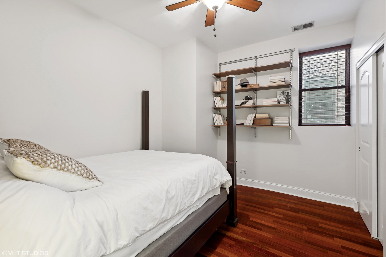 1965 West Cullom Avenue, Unit 3 Chicago, IL 60613 - Photo 15 of 19 a bedroom with a bed and a window