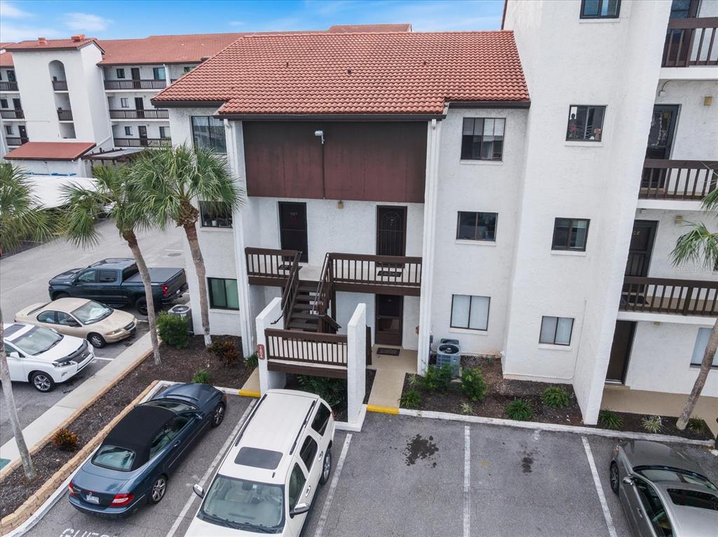 1604 Stickney Point Road, Unit 4102 Sarasota, FL 34231 - Photo 1 of 30 a front view of a house with garden