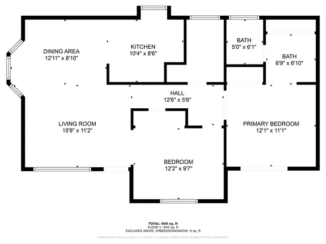 a picture of a wall with a white sign