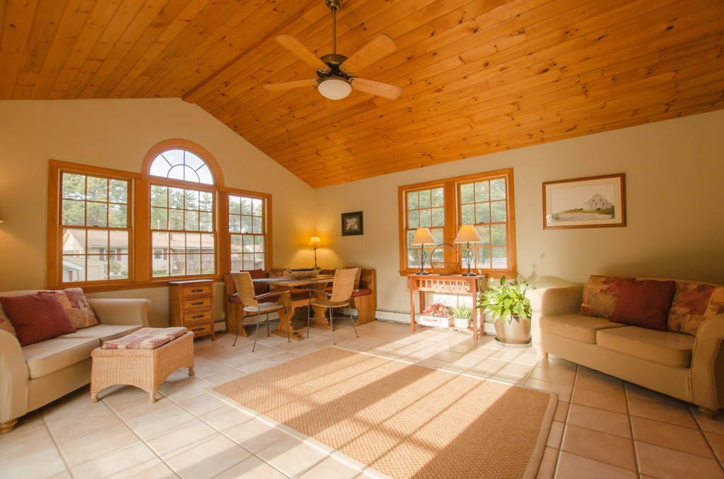 19 Mattapoisett Road Acushnet, MA 02743 - Photo 3 of 18 a living room with furniture and a large window