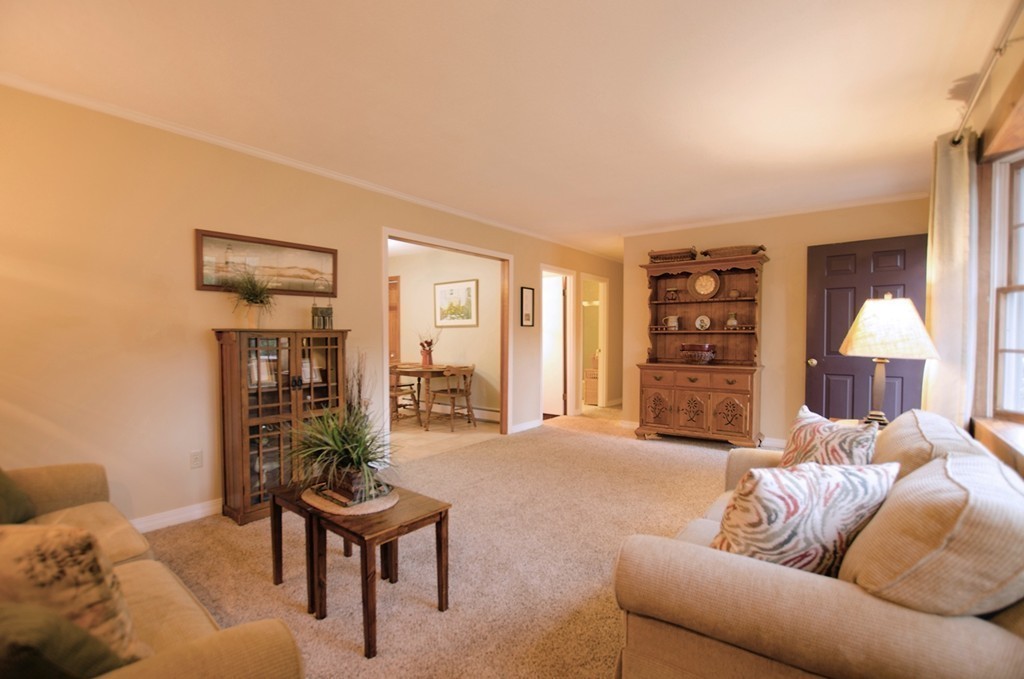 19 Mattapoisett Road Acushnet, MA 02743 - Photo 7 of 18 a living room with furniture and a large window