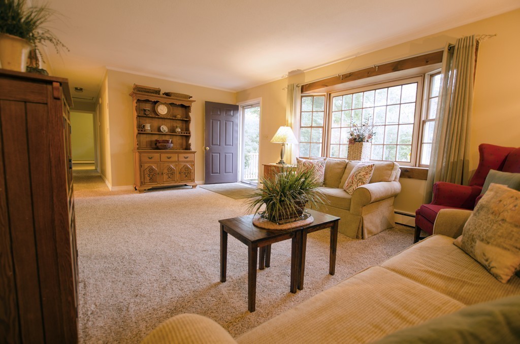 19 Mattapoisett Road Acushnet, MA 02743 - Photo 8 of 18 a living room with furniture and a window