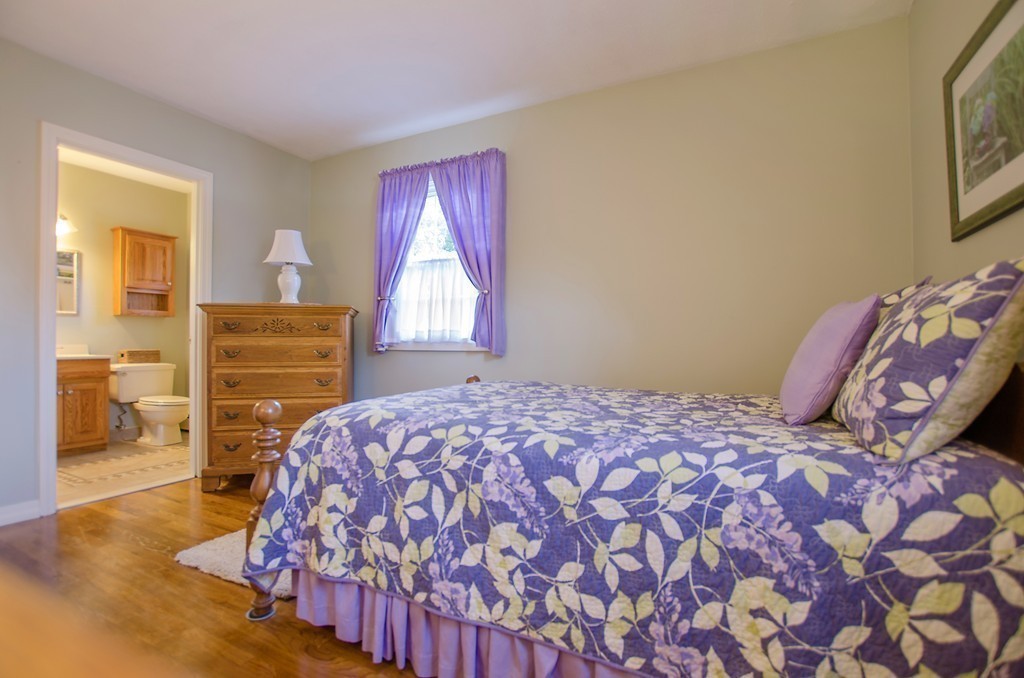 19 Mattapoisett Road Acushnet, MA 02743 - Photo 10 of 18 a bedroom with a bed and a dresser