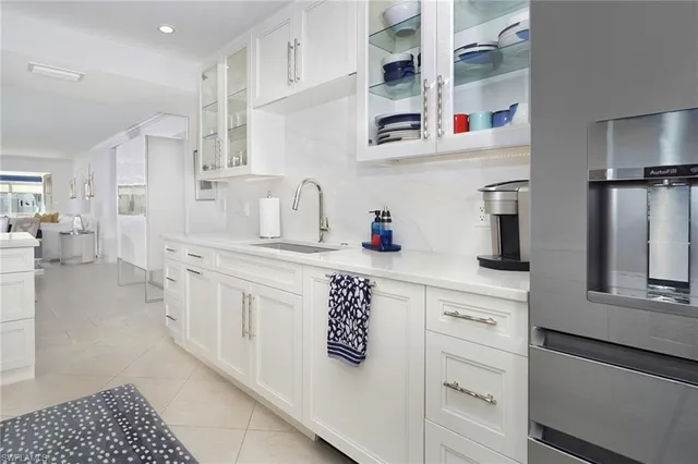a kitchen with stainless steel appliances cabinets and a counter top space