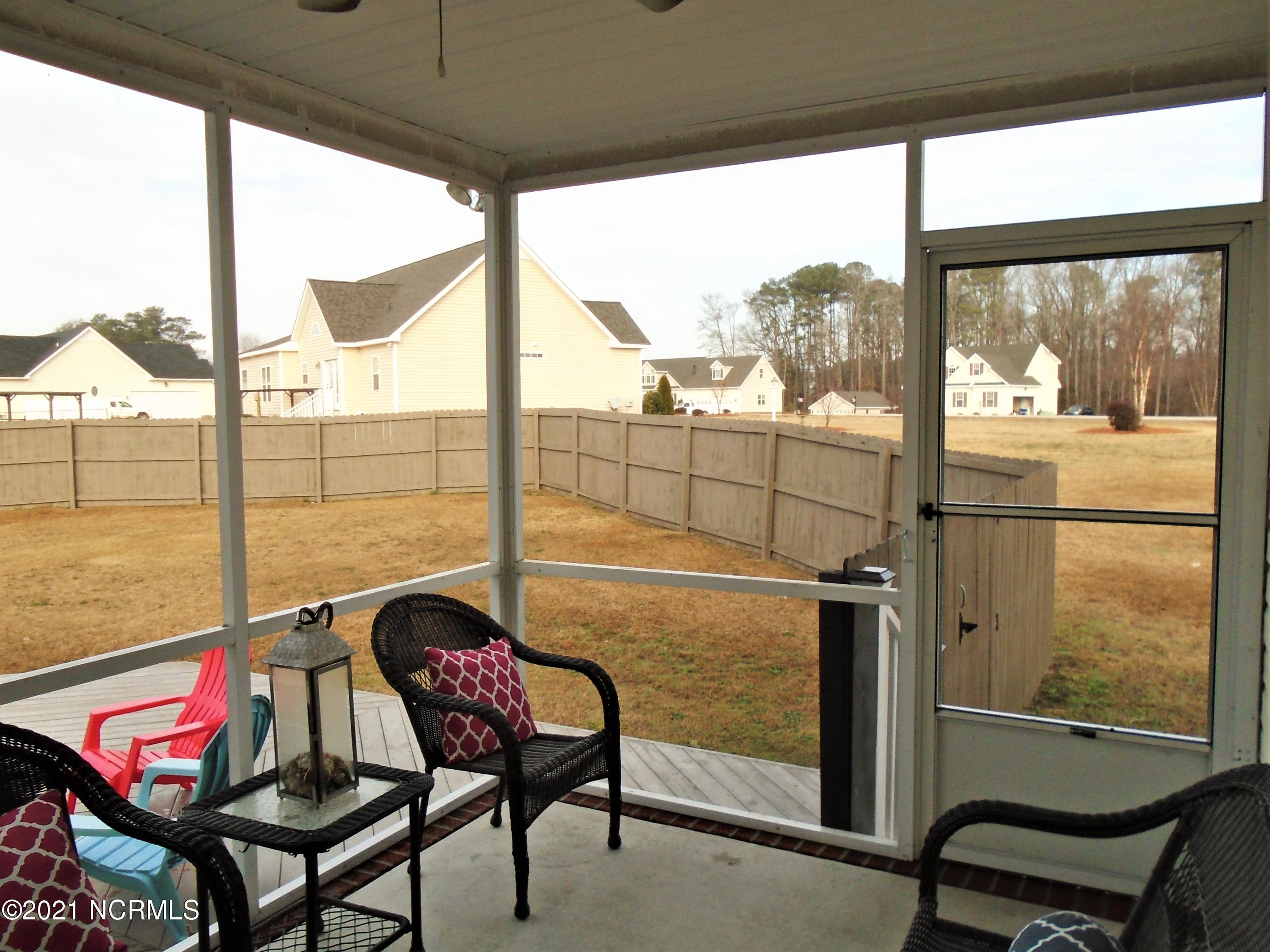 4033 Baybrook Road Nashville, NC 27856 - Photo 7 of 46 Screened Porch.