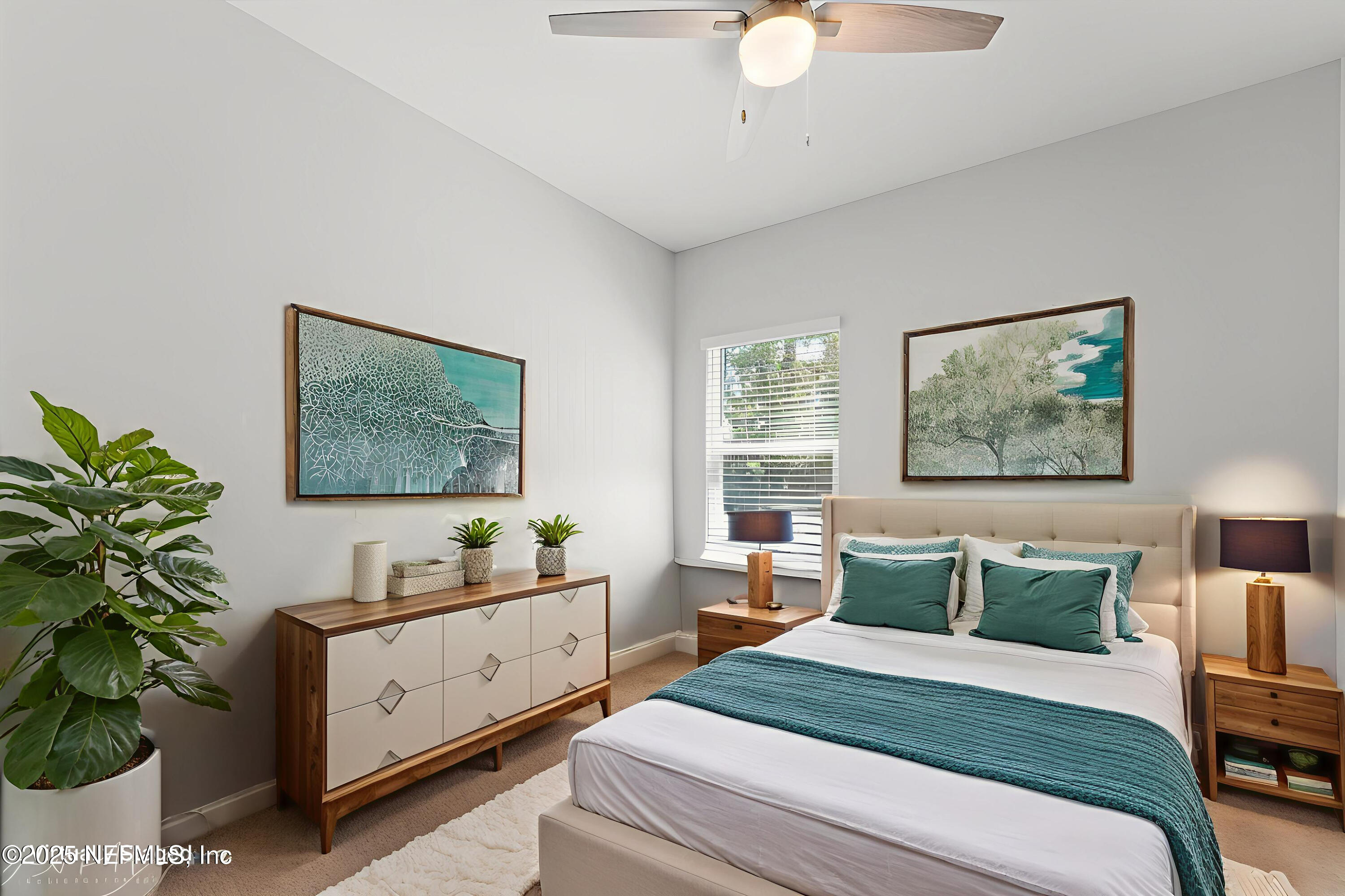 3060 Free Bird Loop Green Cove Springs, FL 32043 - Photo 18 of 94 a bedroom with a bed and a potted plant