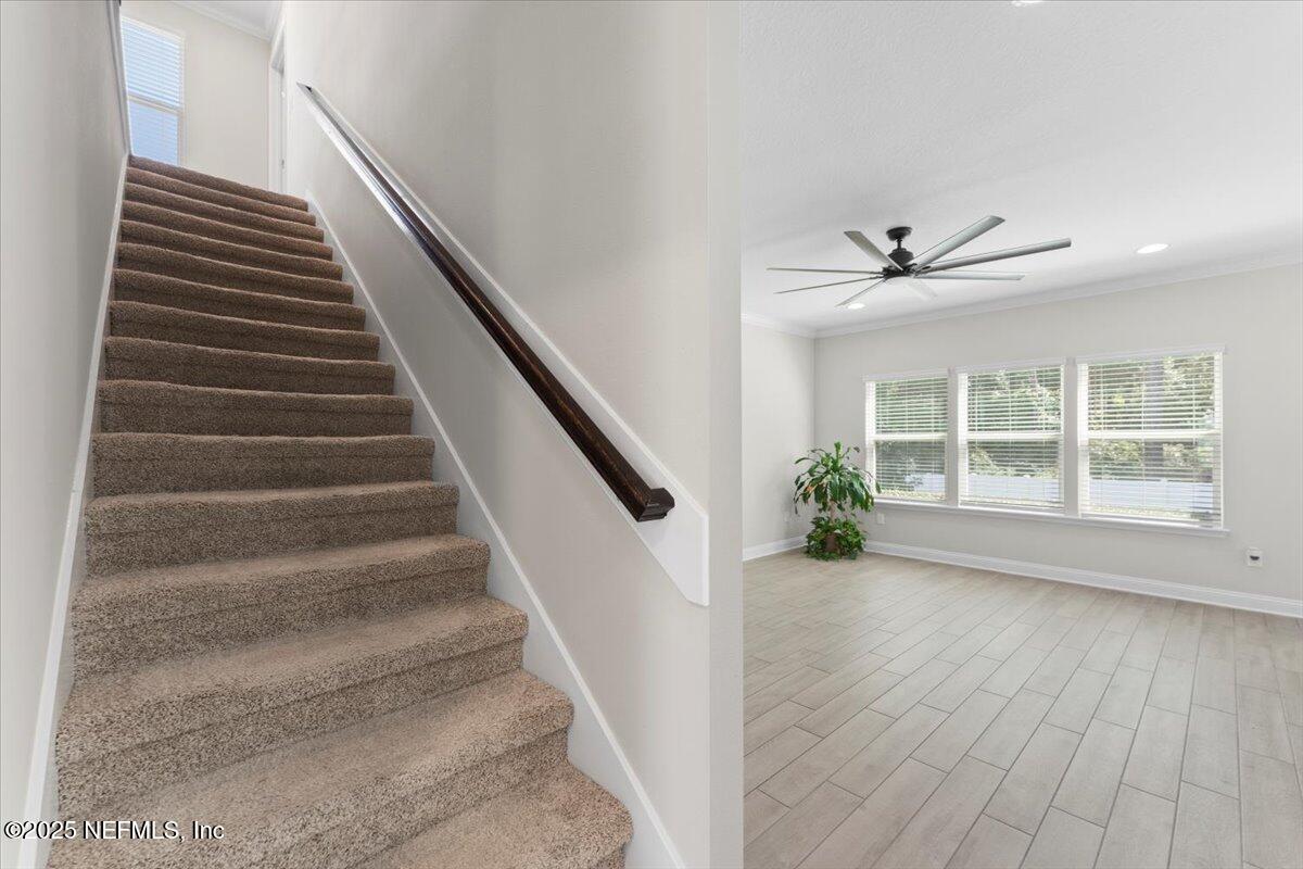 3060 Free Bird Loop Green Cove Springs, FL 32043 - Photo 20 of 94 a view of an entryway with wooden floor and windows