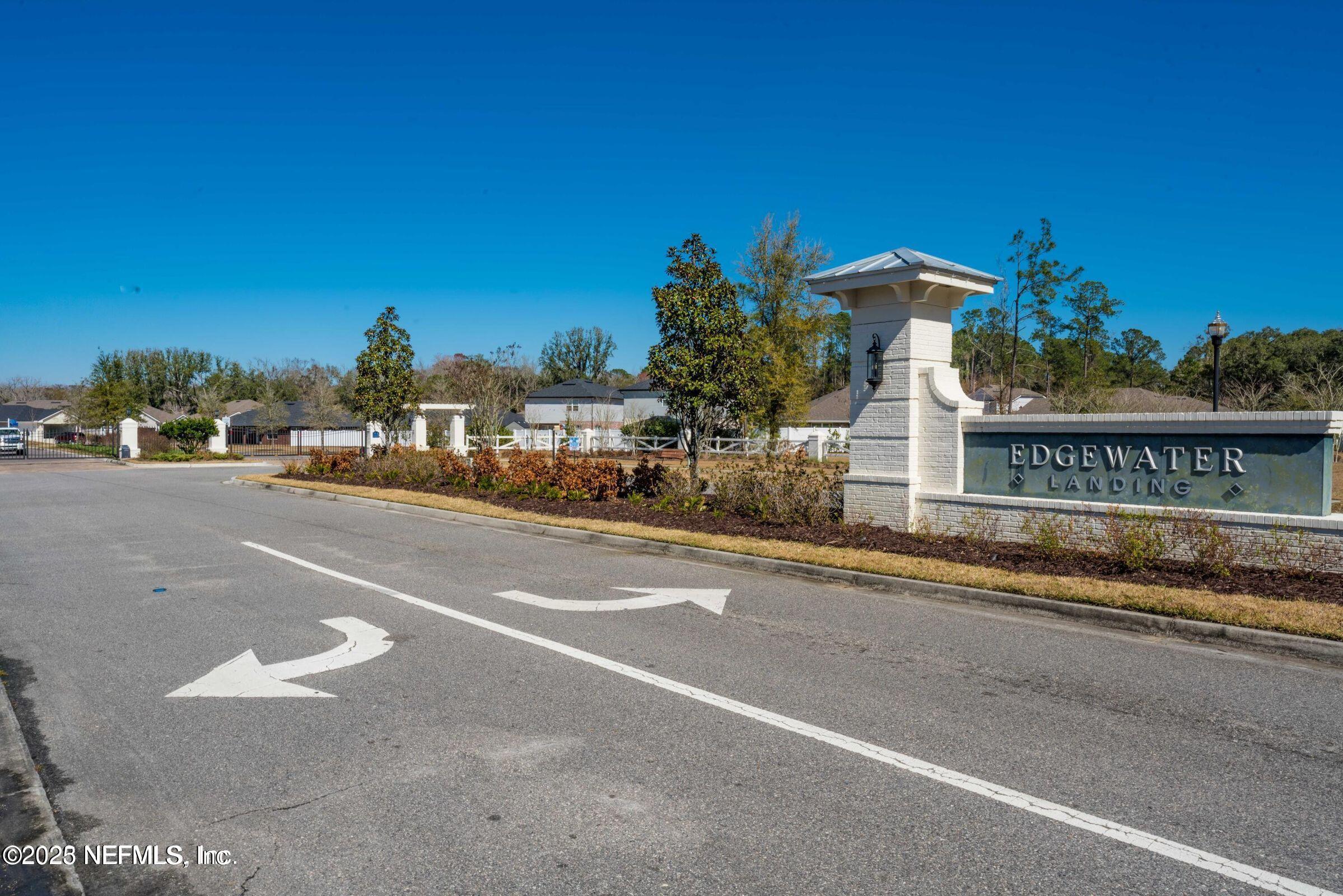 3060 Free Bird Loop Green Cove Springs, FL 32043 - Photo 89 of 94 a view of a street with a building in the background