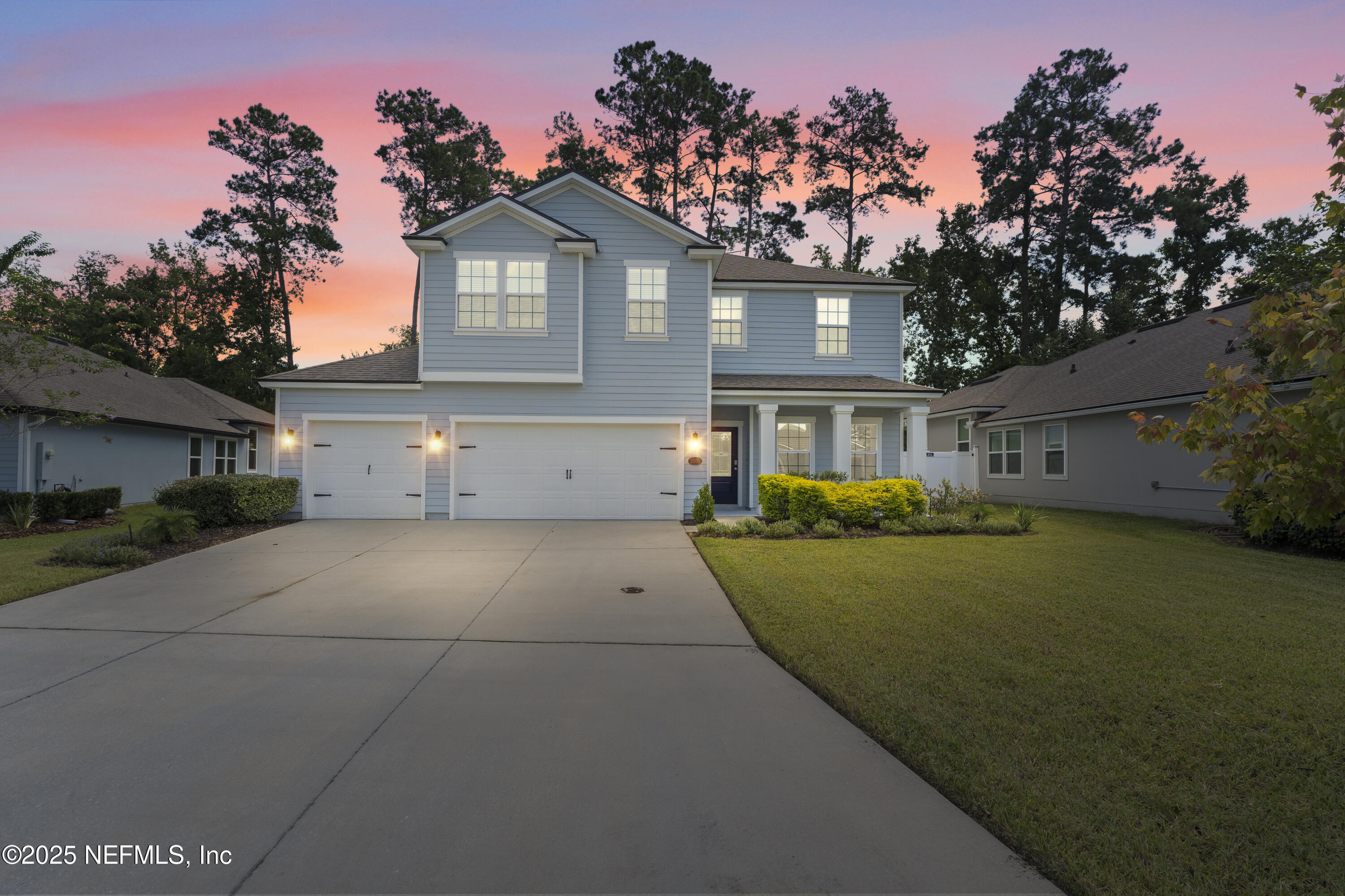 3060 Free Bird Loop Green Cove Springs, FL 32043 - Photo 94 of 94 a front view of a house with a garden