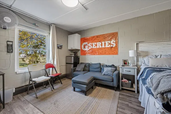 a living room with furniture and a window