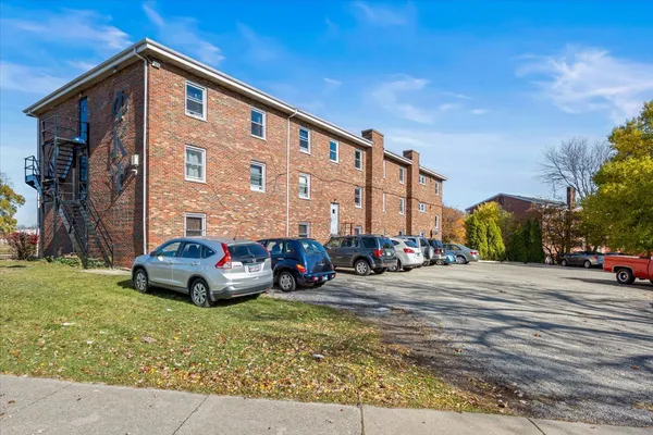 a car parked in front of a house