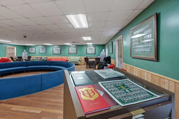 a bed room with furniture and window