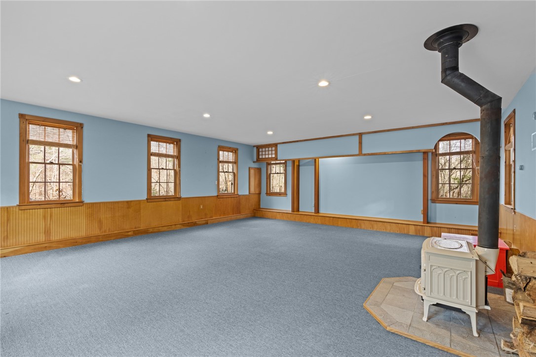 60 Meadowbrook Road Richmond, RI 02898 - Photo 29 of 44 Guesthouse-1st Floor with Jotul wood burning stove