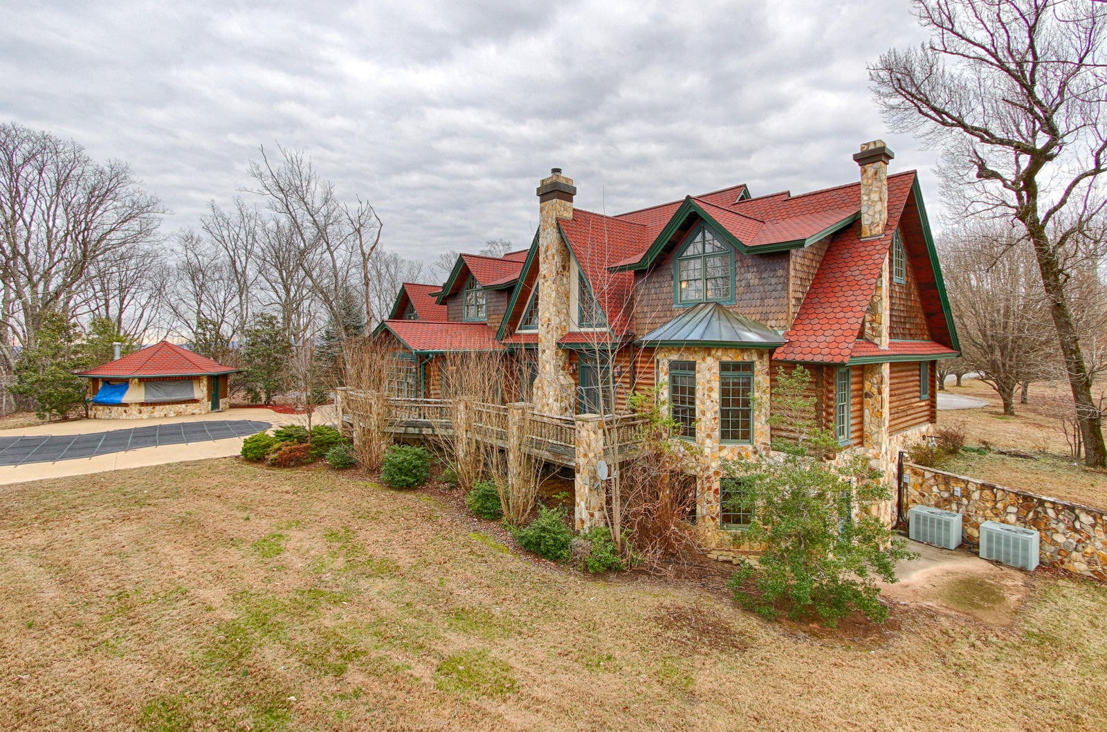 1240 Grape Rough Road Oneida, TN 37841 - Photo 14 of 40 a view of a house with a yard and garage