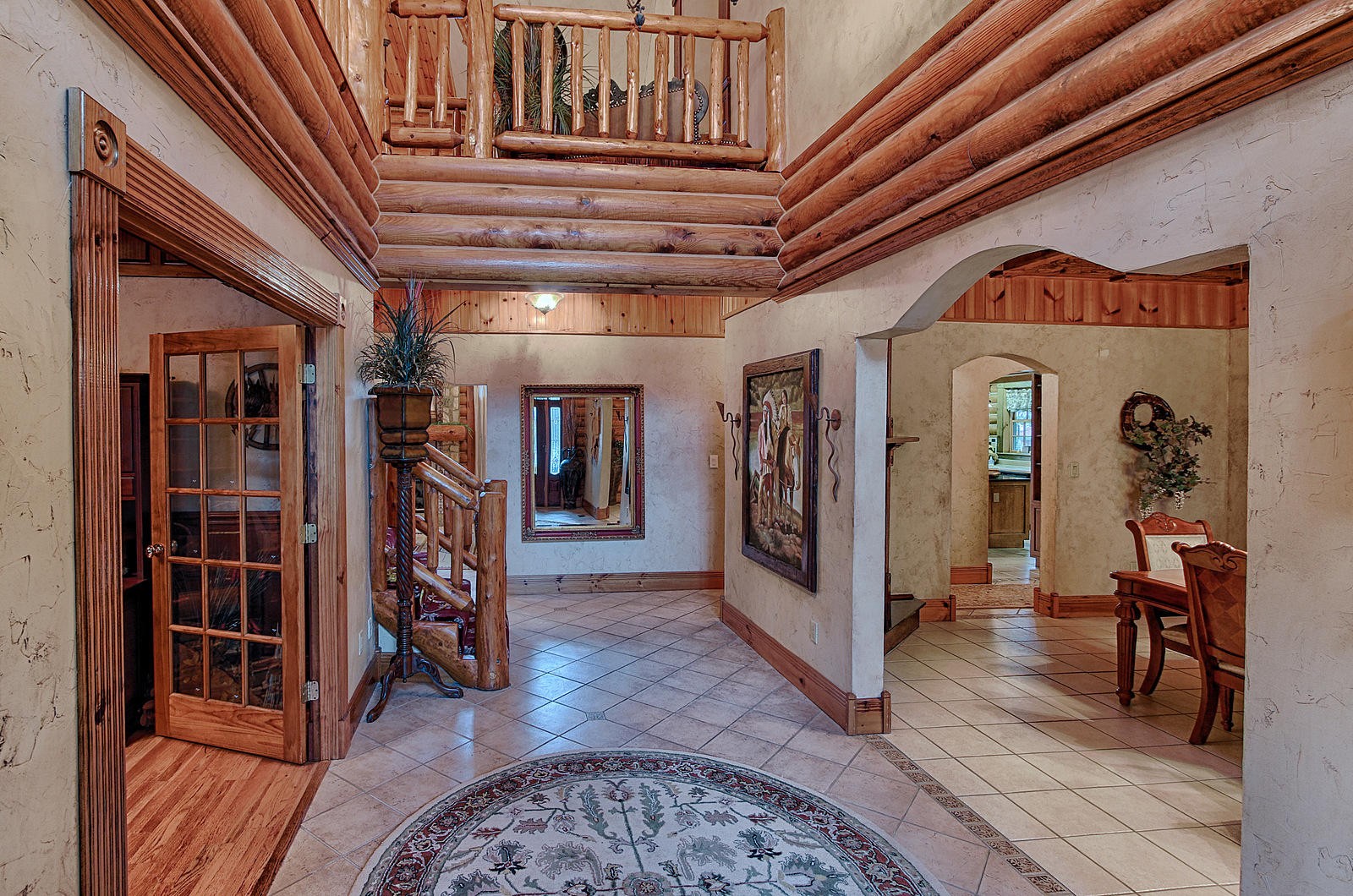 1240 Grape Rough Road Oneida, TN 37841 - Photo 17 of 40 a view of a hallway with wooden floors and livingroom