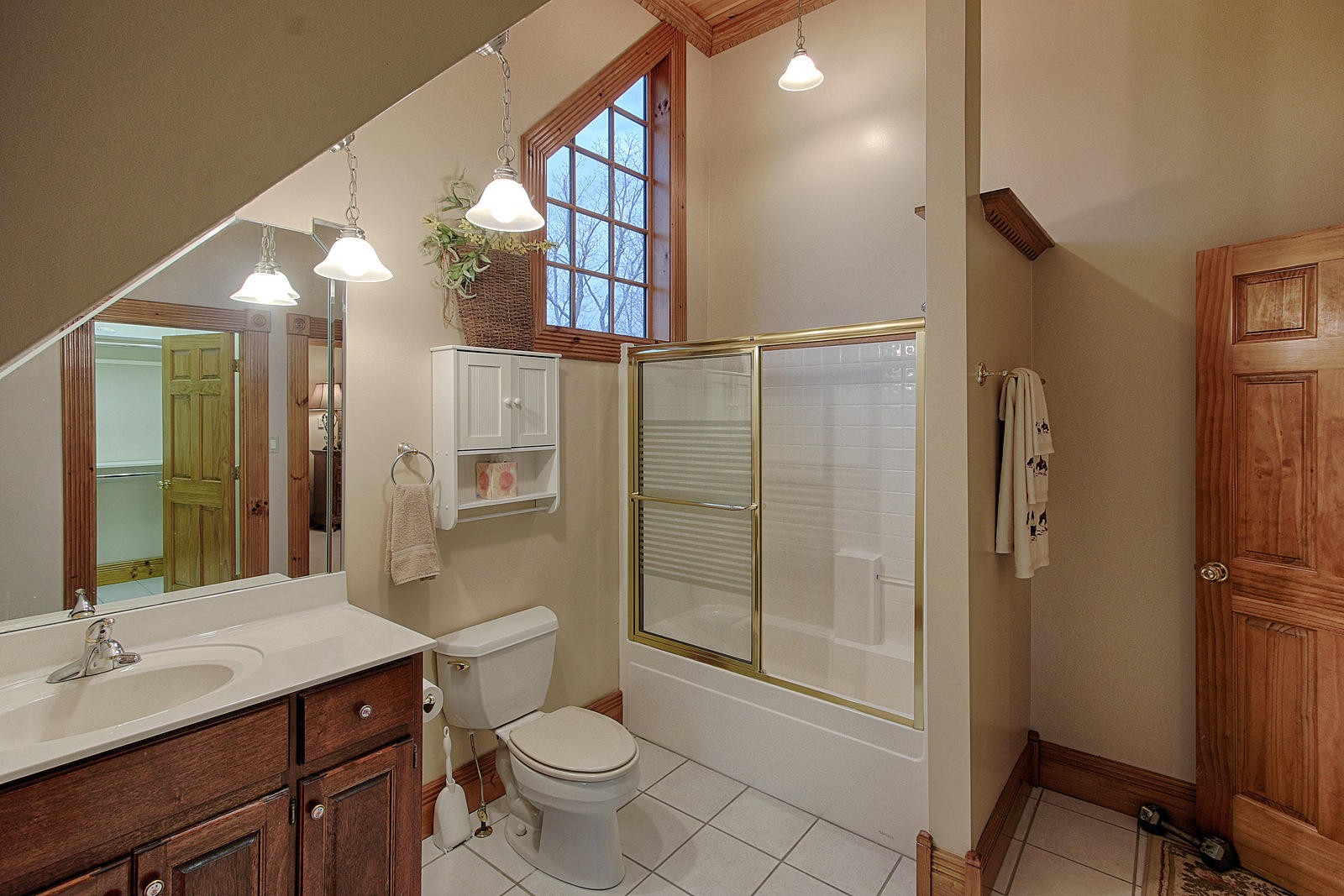 1240 Grape Rough Road Oneida, TN 37841 - Photo 36 of 40 a bathroom with a sink a toilet and shower
