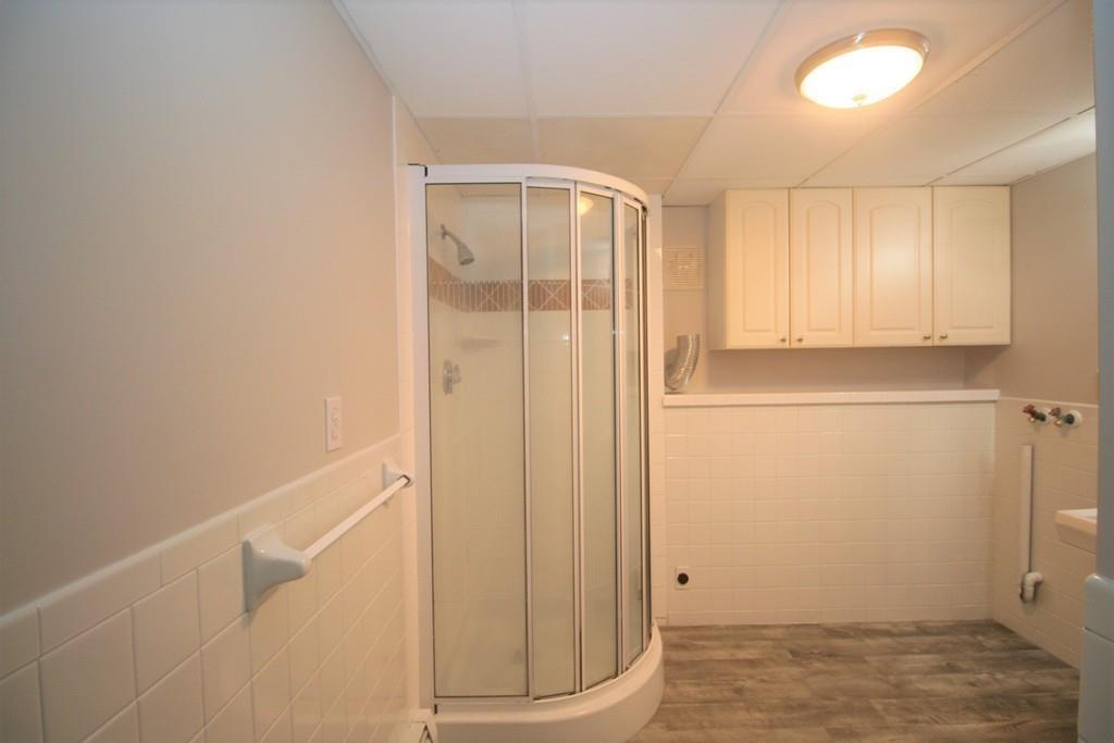 10 Silverbrook Road Topsfield, MA 01983 - Photo 19 of 25 a view of a room with wooden floor and cabinet