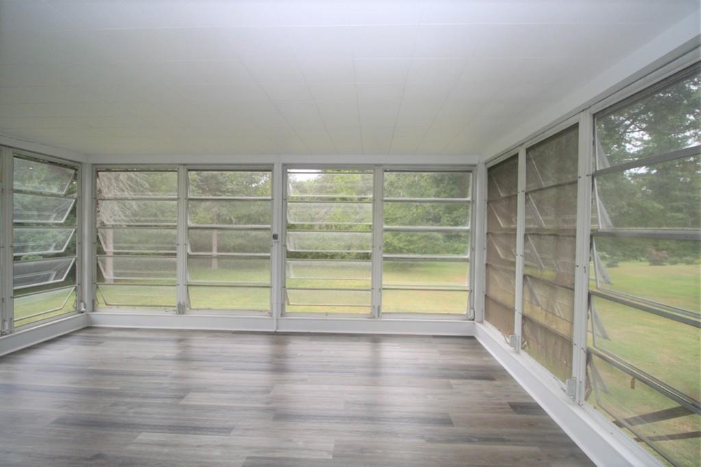10 Silverbrook Road Topsfield, MA 01983 - Photo 22 of 25 a view of a room with wooden floor and windows