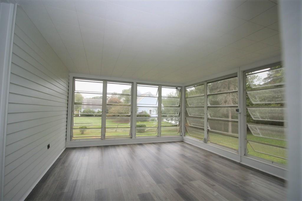 10 Silverbrook Road Topsfield, MA 01983 - Photo 23 of 25 wooden floor in an empty room with a window