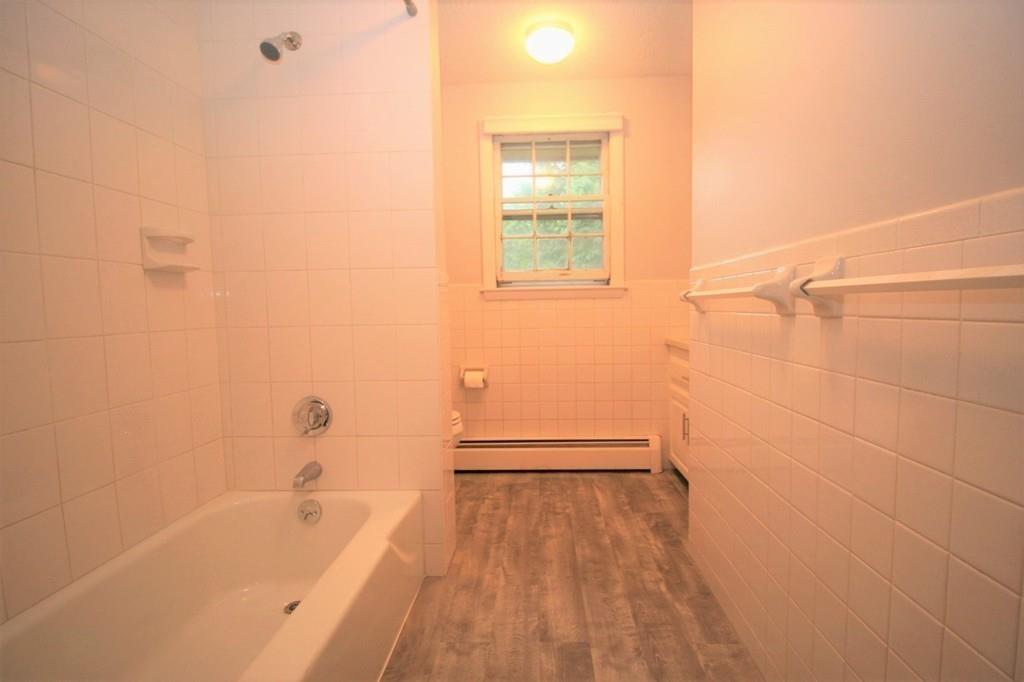 10 Silverbrook Road Topsfield, MA 01983 - Photo 10 of 25 a bathroom with a bathtub and a shower