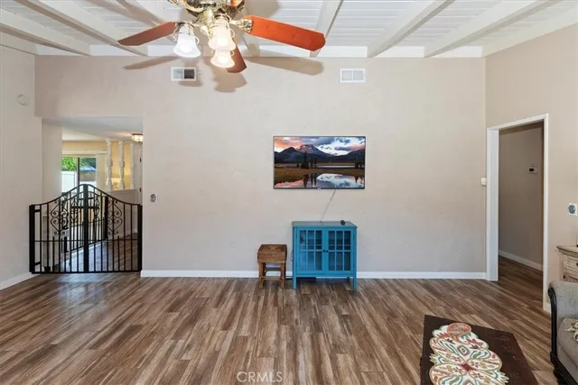 a kitchen with stainless steel appliances granite countertop a sink a stove and cabinets