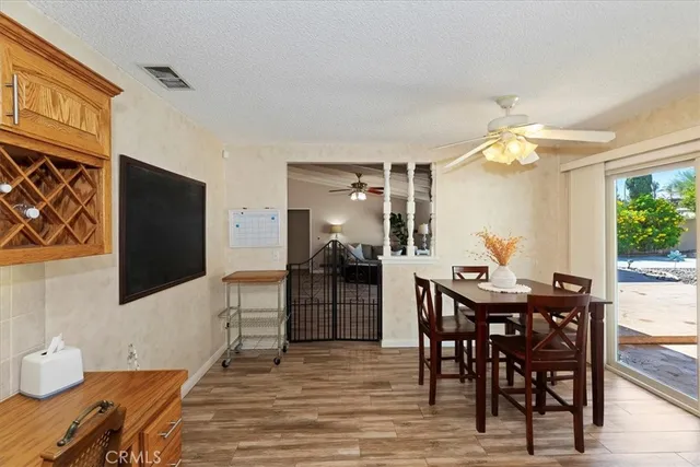 a bedroom with furniture and a chandelier