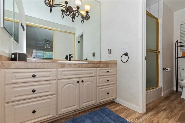 a view of a street with benches in the background