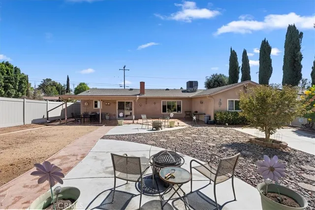 a view of outdoor space with deck and lake view