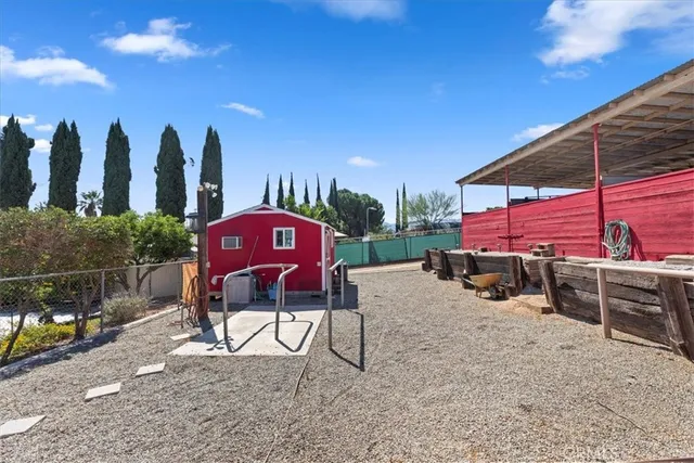 a view of roof deck with outdoor seating and city view